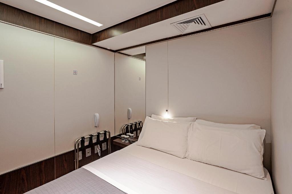 FAST SLEEP Guarulhos by Slaviero Hotéisにあるベッド