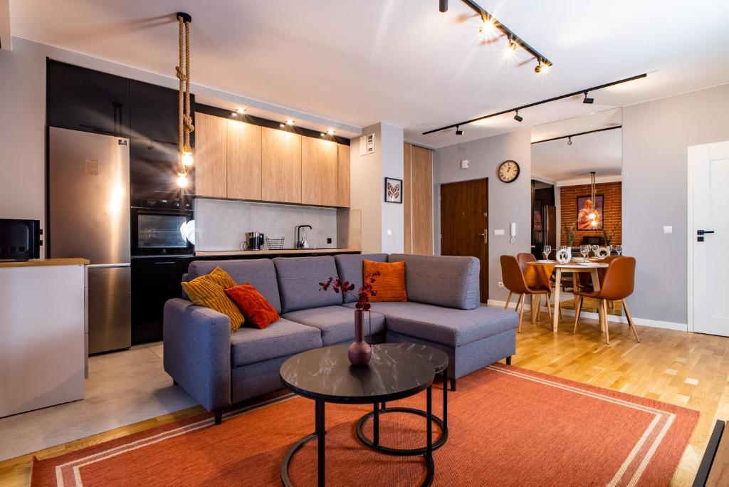 Η κουζίνα ή μικρή κουζίνα στο ApartamentySnu, Słoneczny Komfort, Centrum