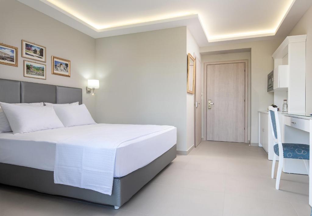 Postel nebo postele na pokoji v ubytování Light Blue Hotel