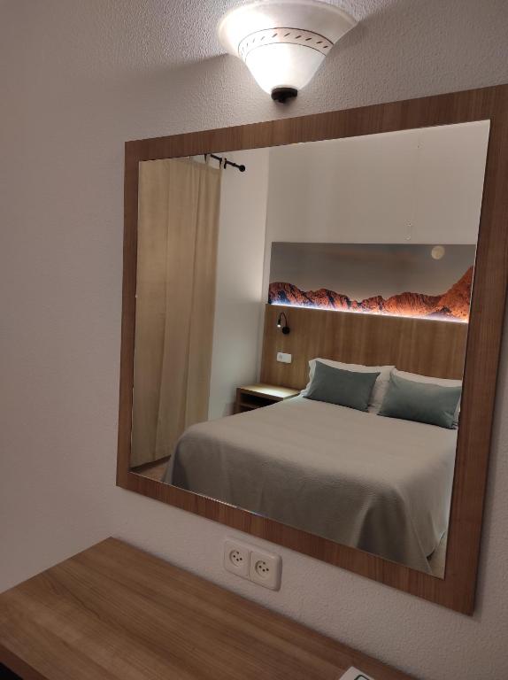 Postel nebo postele na pokoji v ubytování Hostal Nadal