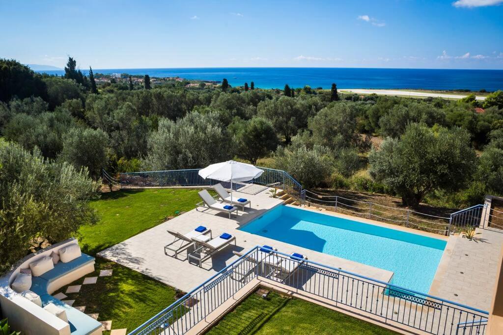 an aerial view of a villa with a swimming pool at Forget me not Villa No 2 in Svoronata