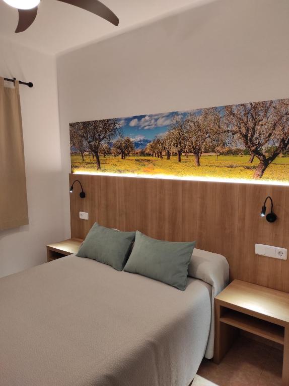Postel nebo postele na pokoji v ubytování Hostal Nadal