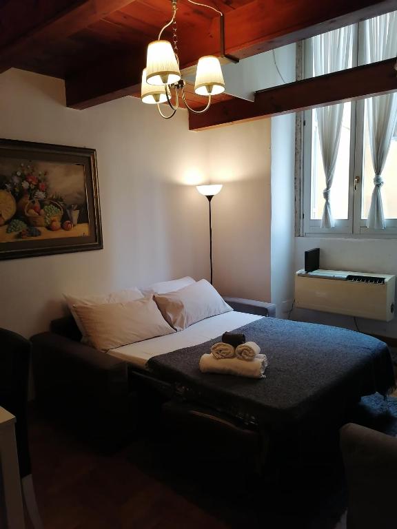 Posteľ alebo postele v izbe v ubytovaní Coronari 45 apartment