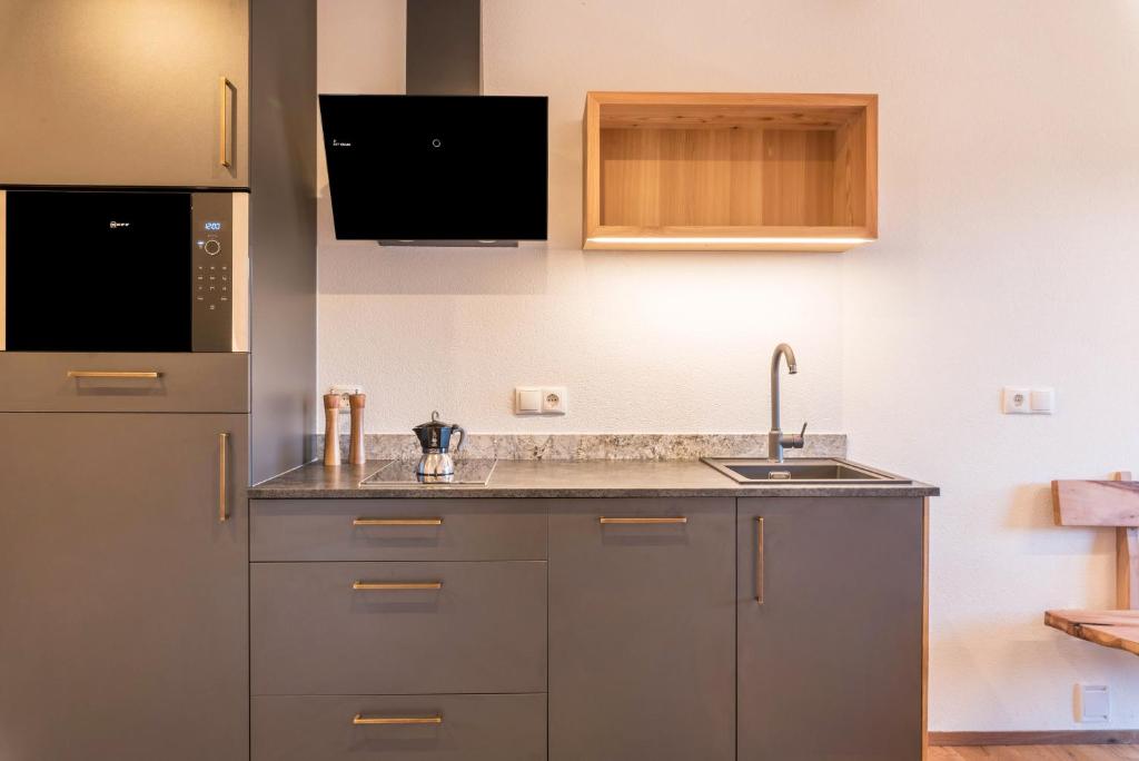 Kuchyň nebo kuchyňský kout v ubytování Aschnerhof Holzhitt
