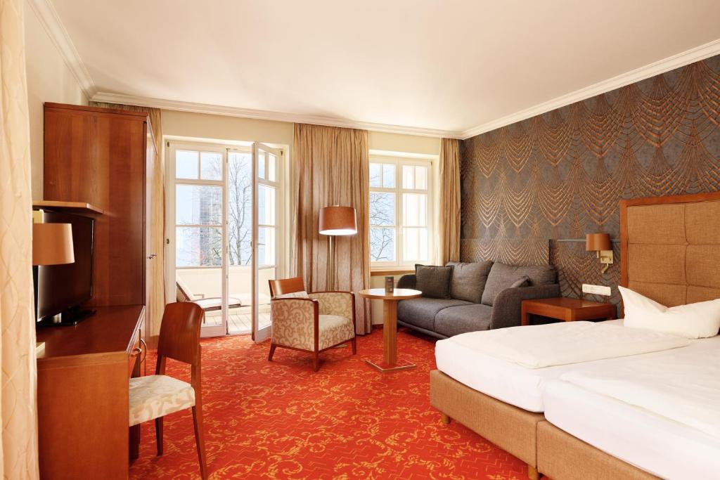 Postel nebo postele na pokoji v ubytování Hotel Mohren