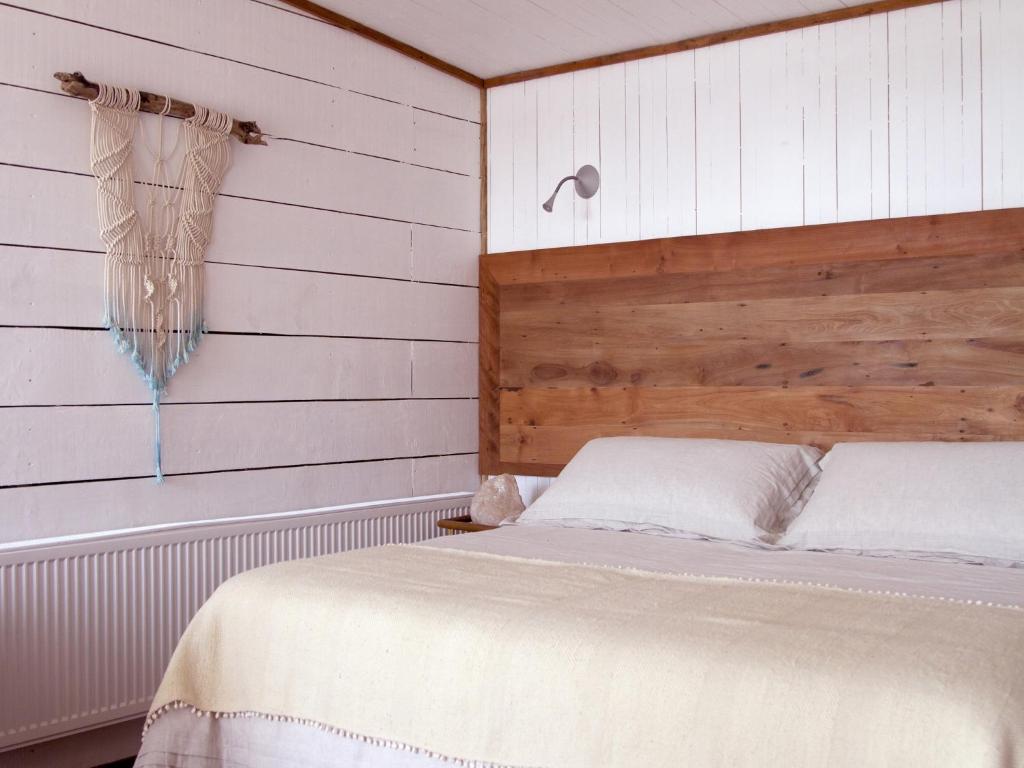 Postel nebo postele na pokoji v ubytování Cuarzo Lodge