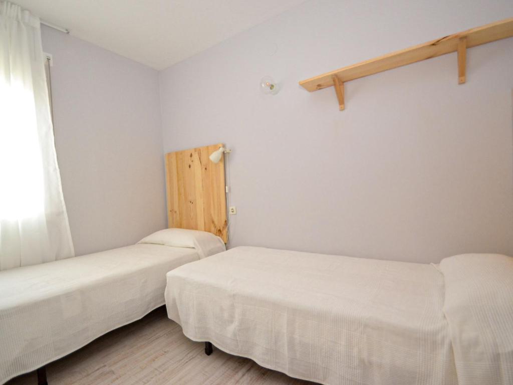 Postel nebo postele na pokoji v ubytování Apartment Gavina Salou-1 by Interhome