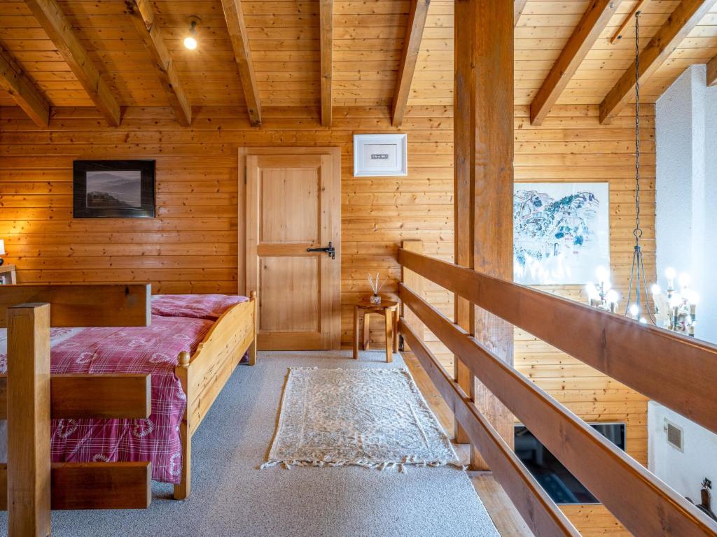 Postel nebo postele na pokoji v ubytování Chalet Le Sorbier by Interhome