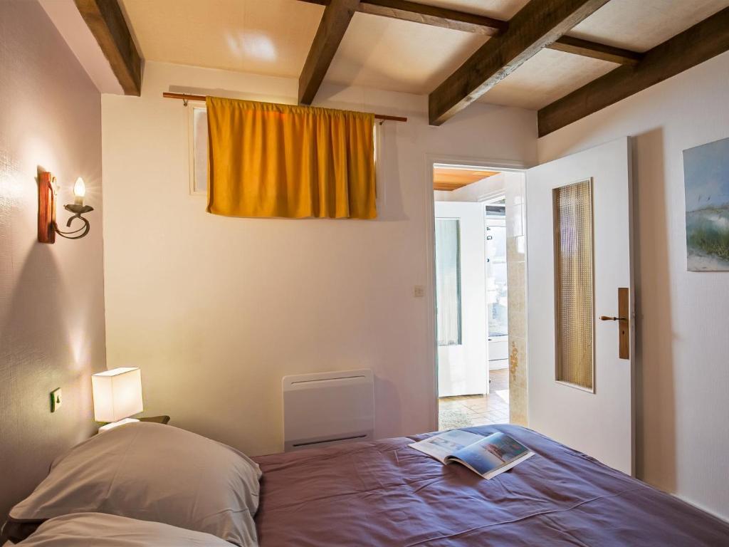 Posteľ alebo postele v izbe v ubytovaní Holiday Home Ty Lez by Interhome