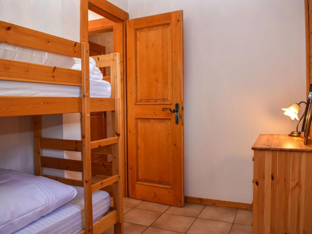 Postel nebo postele na pokoji v ubytování Apartment Rüthanet by Interhome