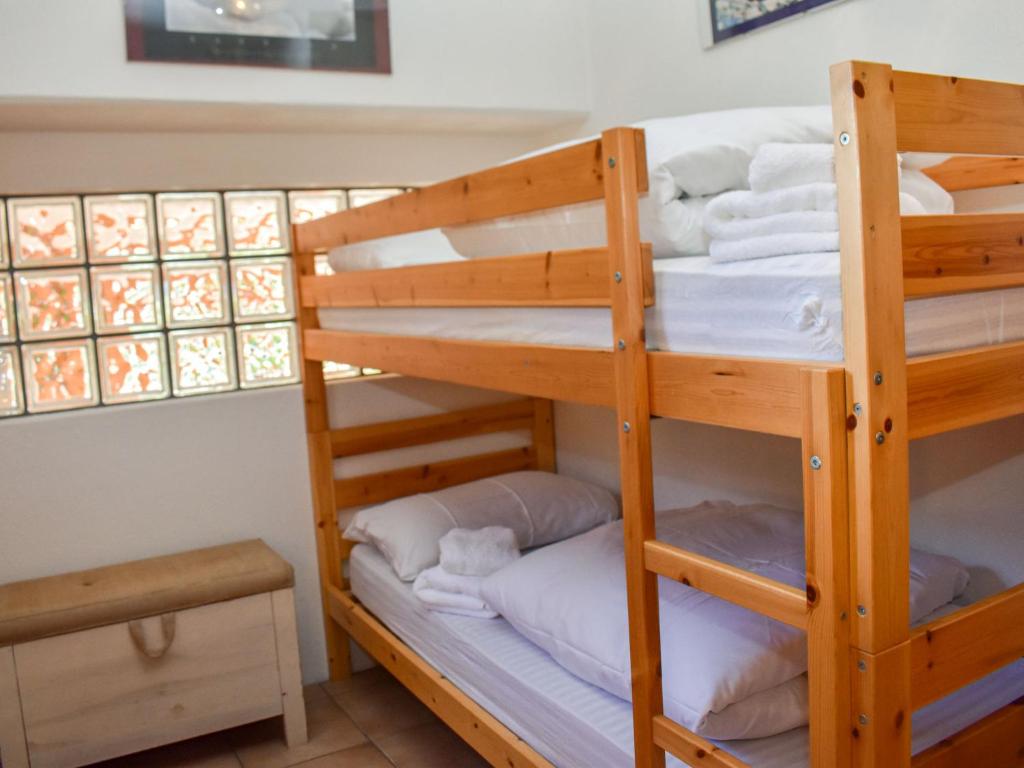Postel nebo postele na pokoji v ubytování Apartment Rüthanet by Interhome