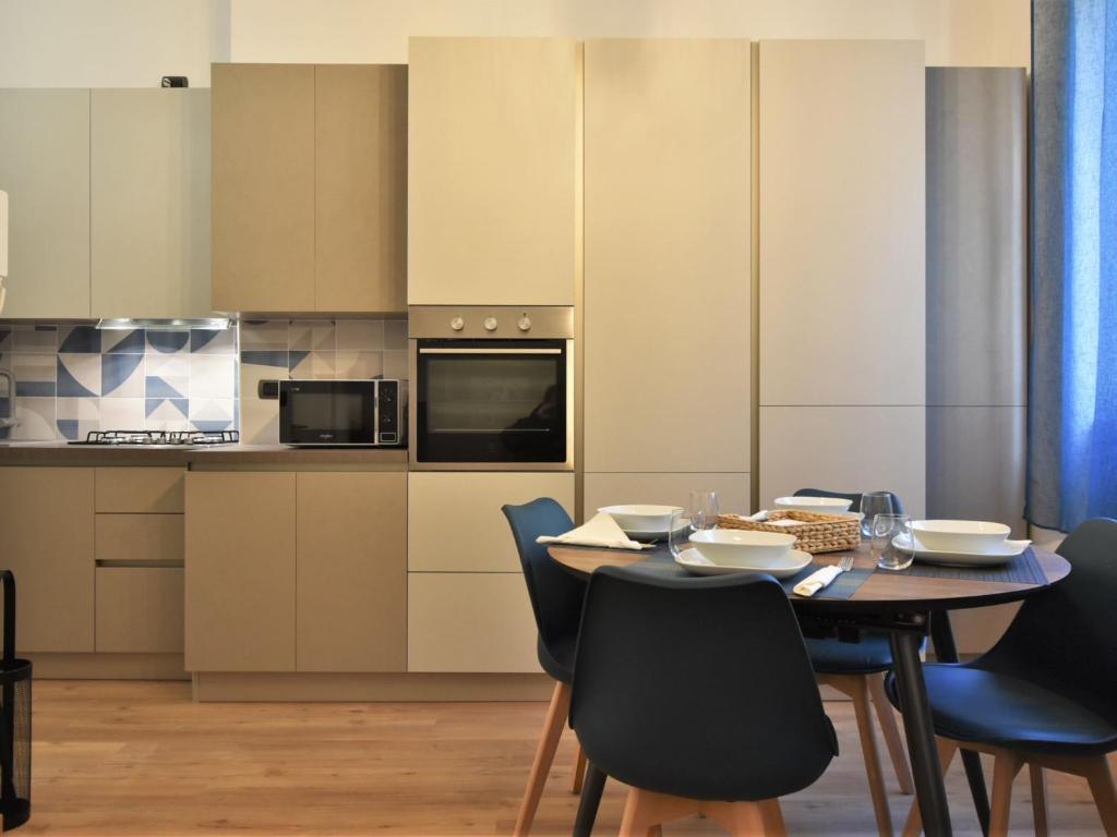A kitchen or kitchenette at Apartment NoLo Flat by Interhome