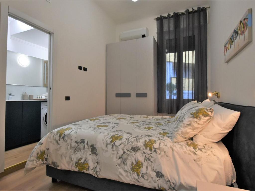 A bed or beds in a room at Apartment NoLo Flat by Interhome