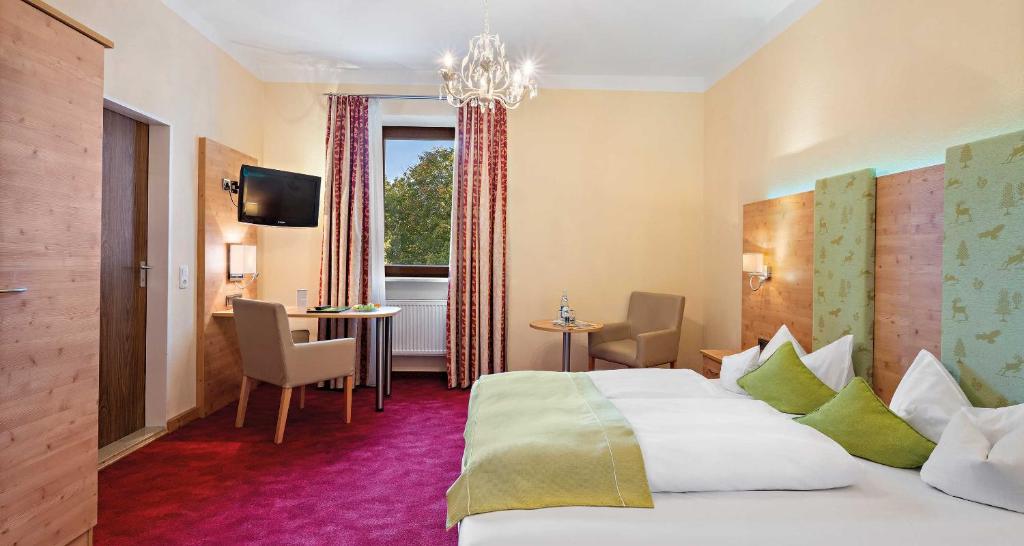 Postel nebo postele na pokoji v ubytování Hotel Liebl