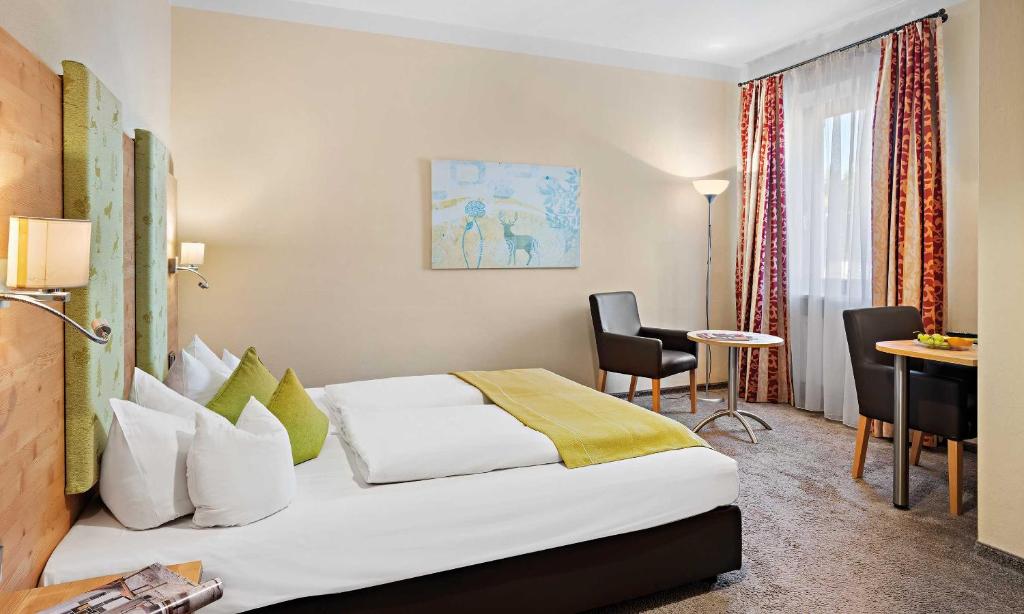 Postel nebo postele na pokoji v ubytování Hotel Liebl