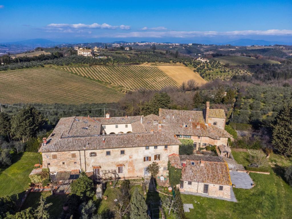 an aerial view of an old house in a vineyard at Apartment Il Convento by Interhome in Bargino