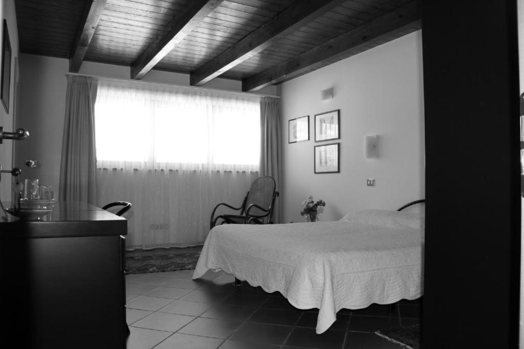 Postel nebo postele na pokoji v ubytování B&B La Betulla