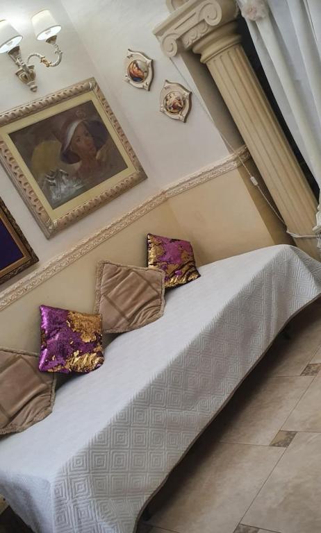 Łóżko lub łóżka w pokoju w obiekcie Regina Suite