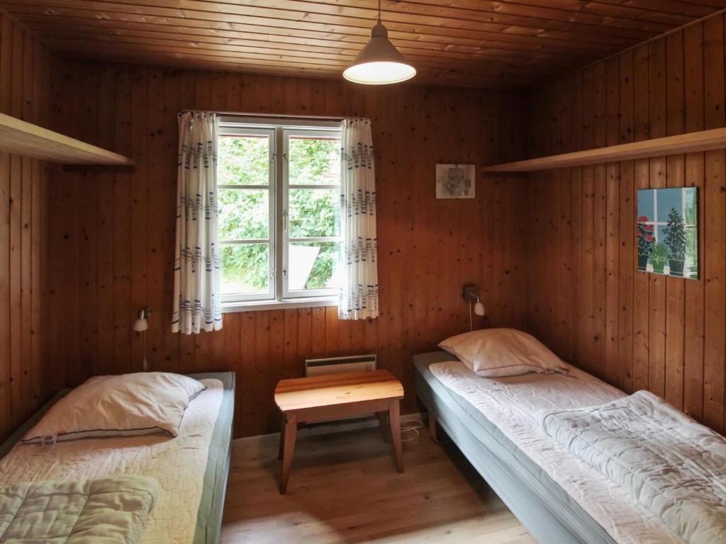 Postel nebo postele na pokoji v ubytování Holiday Home Gunder - 125m from the sea by Interhome