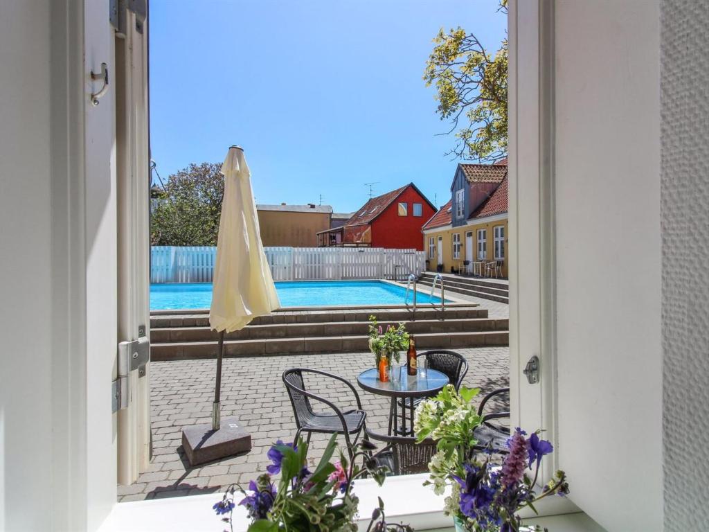 Výhled na bazén z ubytování Apartment Thyrne - 500m from the sea in Bornholm by Interhome nebo okolí