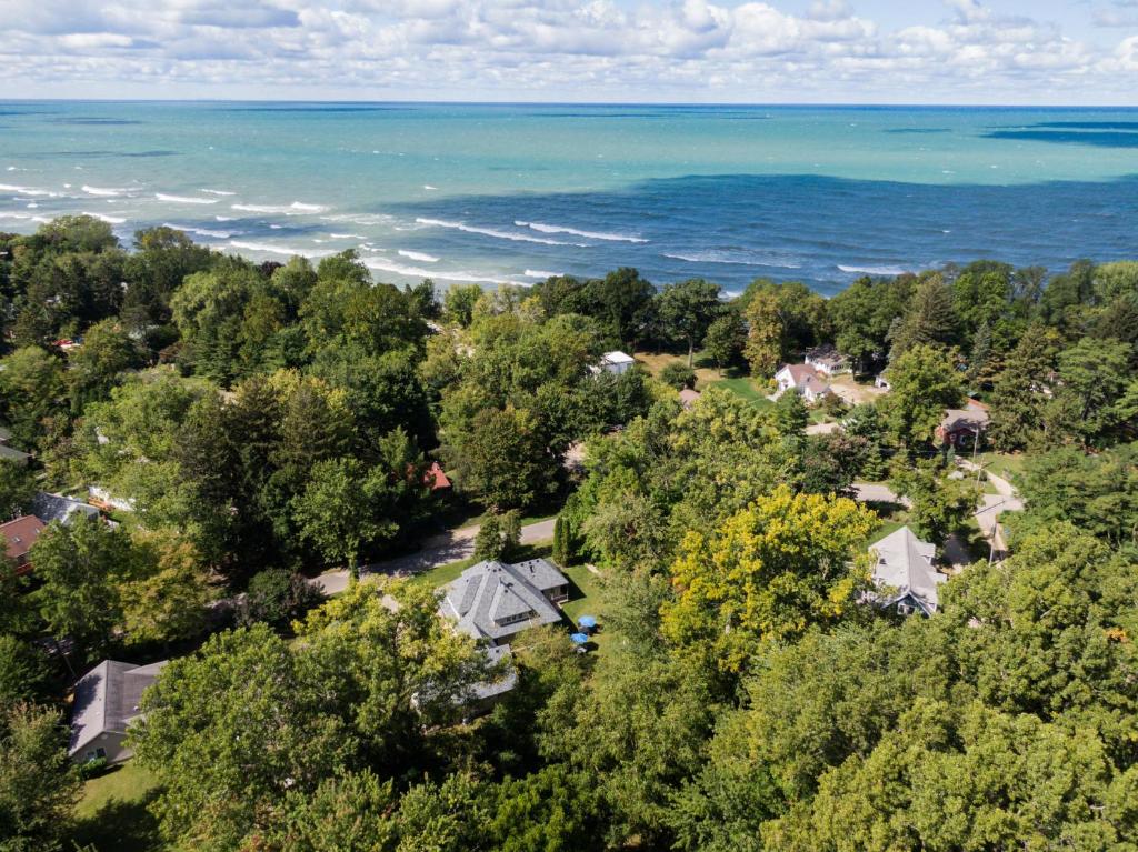 an aerial view of a home with the ocean in the background at Victory Gardens in Union Pier