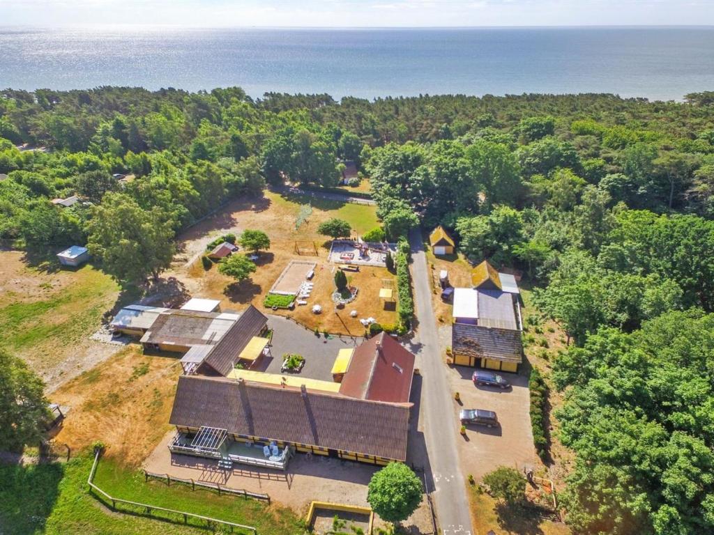 an aerial view of a house with the ocean in the background at Apartment Syzett - 250m from the sea by Interhome in Neksø