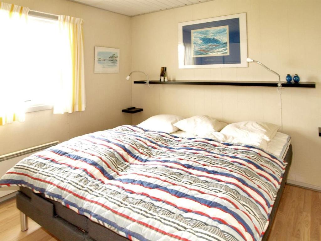 Postel nebo postele na pokoji v ubytování Holiday Home Iikka - 300m from the sea by Interhome
