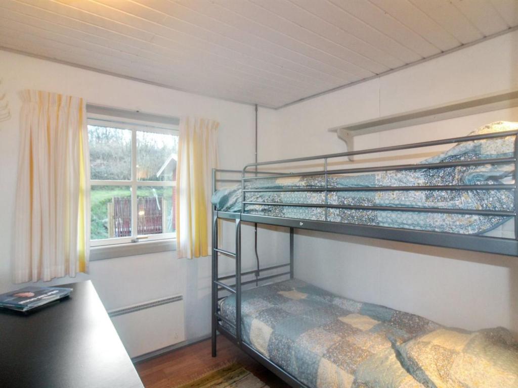 Postel nebo postele na pokoji v ubytování Holiday Home Iikka - 300m from the sea by Interhome