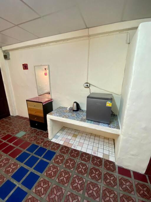 Kuchyň nebo kuchyňský kout v ubytování Ratanawong Place 407