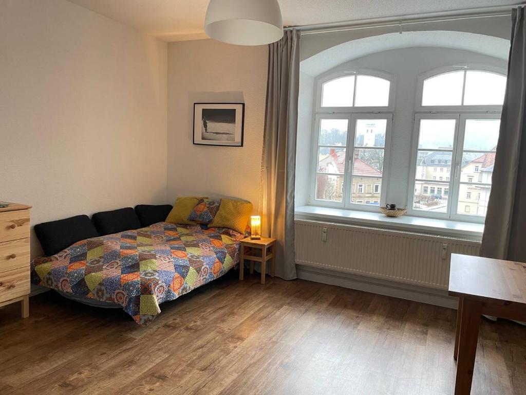 Postel nebo postele na pokoji v ubytování Bergblick Apartment Sächsische Schweiz