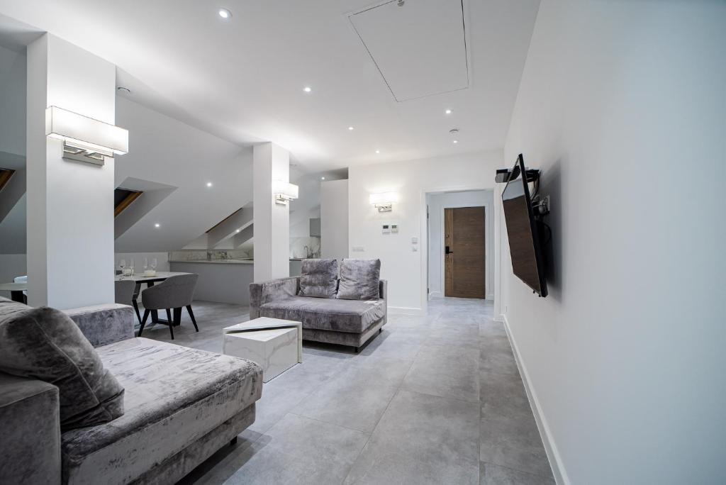 Posedenie v ubytovaní Apartamenty Rynek 7 by Hotel Żywiecki****