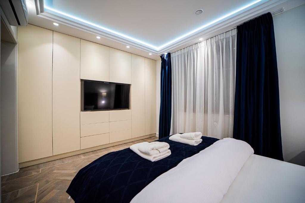 Posteľ alebo postele v izbe v ubytovaní Apartamenty Rynek 7 by Hotel Żywiecki****