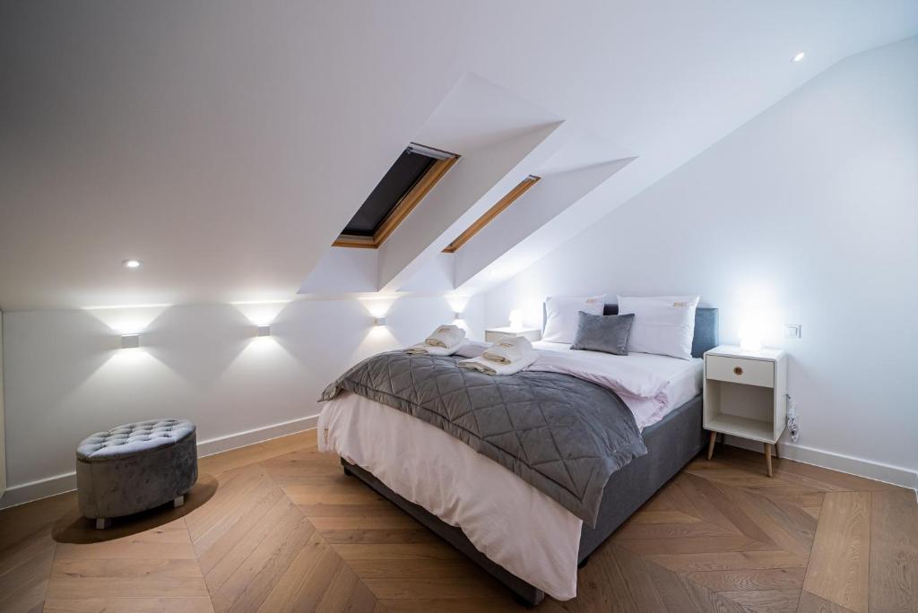 Posteľ alebo postele v izbe v ubytovaní Apartamenty Rynek 7 by Hotel Żywiecki****