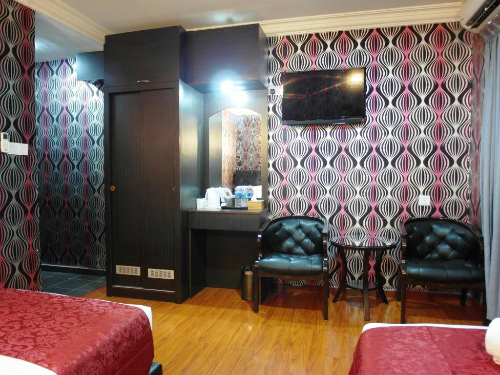 TV a/nebo společenská místnost v ubytování Classic Kinabalu Hotel