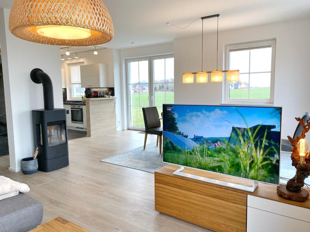 Kuchyň nebo kuchyňský kout v ubytování Ferienhaus Distelfink mit Sauna und Kamin