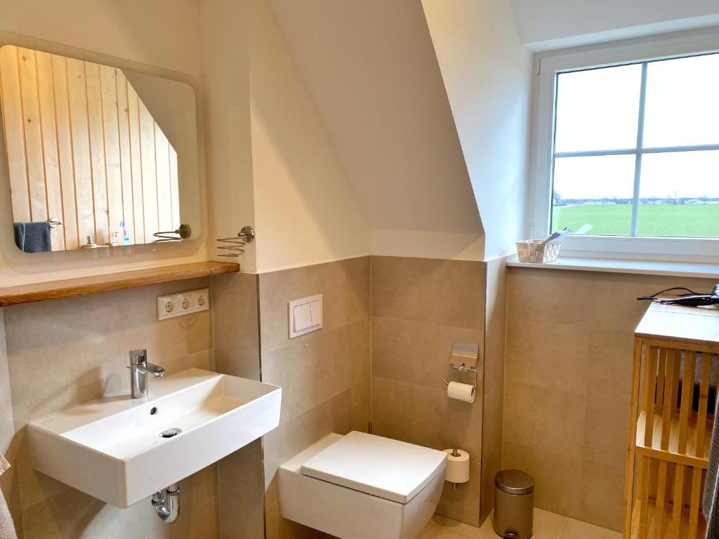 Koupelna v ubytování Ferienhaus Distelfink mit Sauna und Kamin