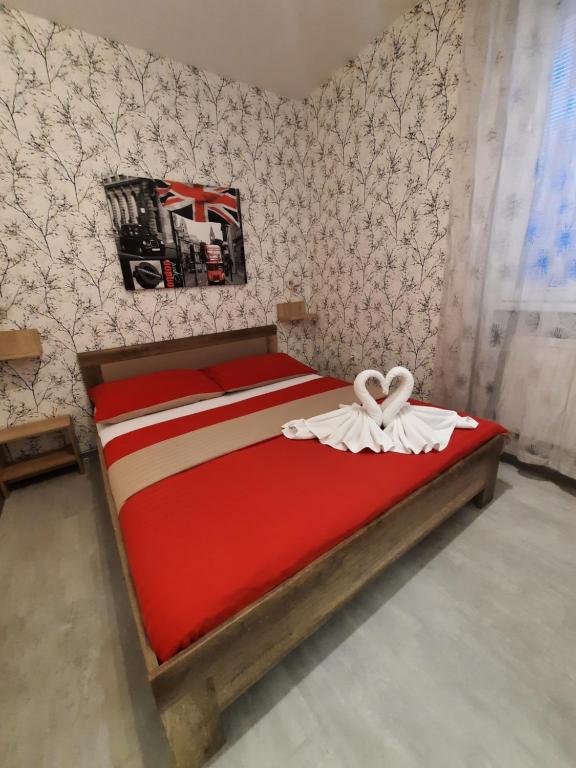 Łóżko lub łóżka w pokoju w obiekcie Hotel Boršičanka