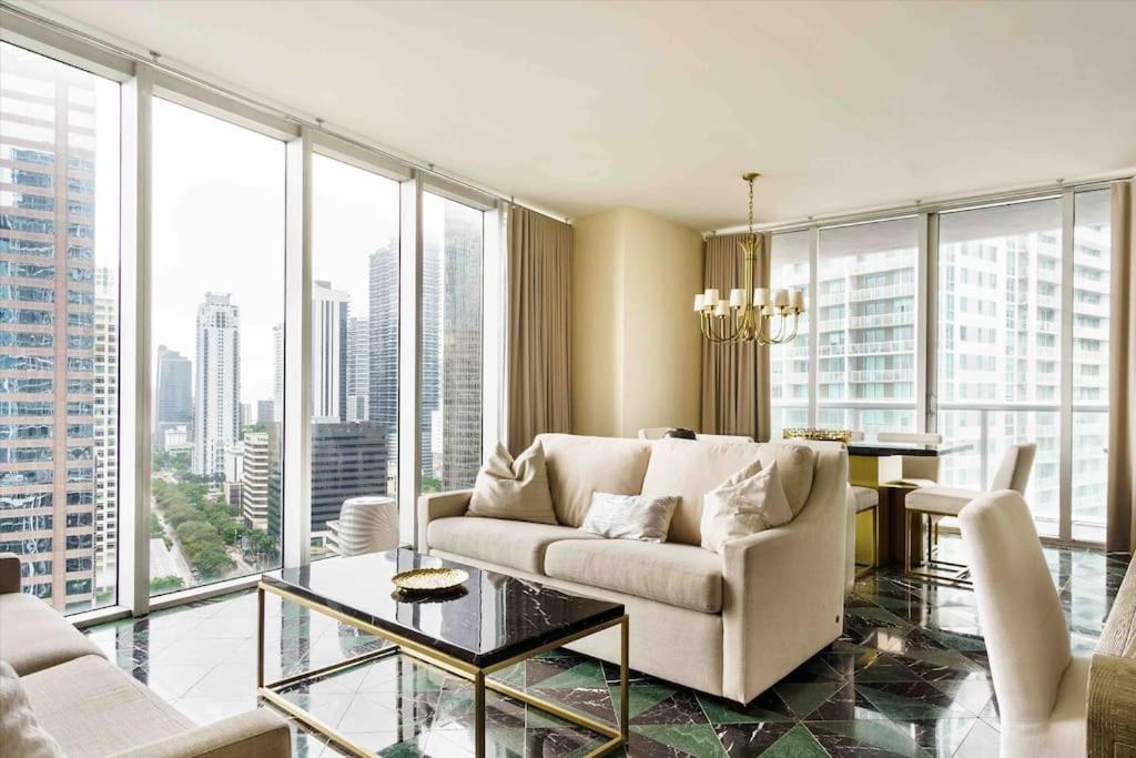 a living room with a couch and a table at 2 Bedroom with stunning views at the W residences in Miami