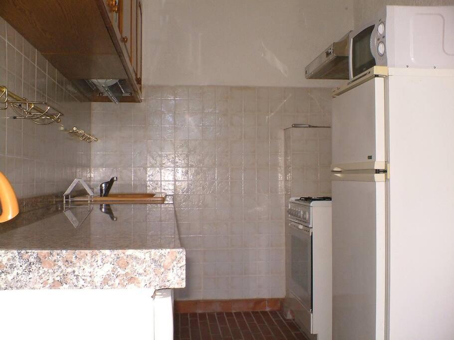 A kitchen or kitchenette at Villa Berio Quattro - Miguel