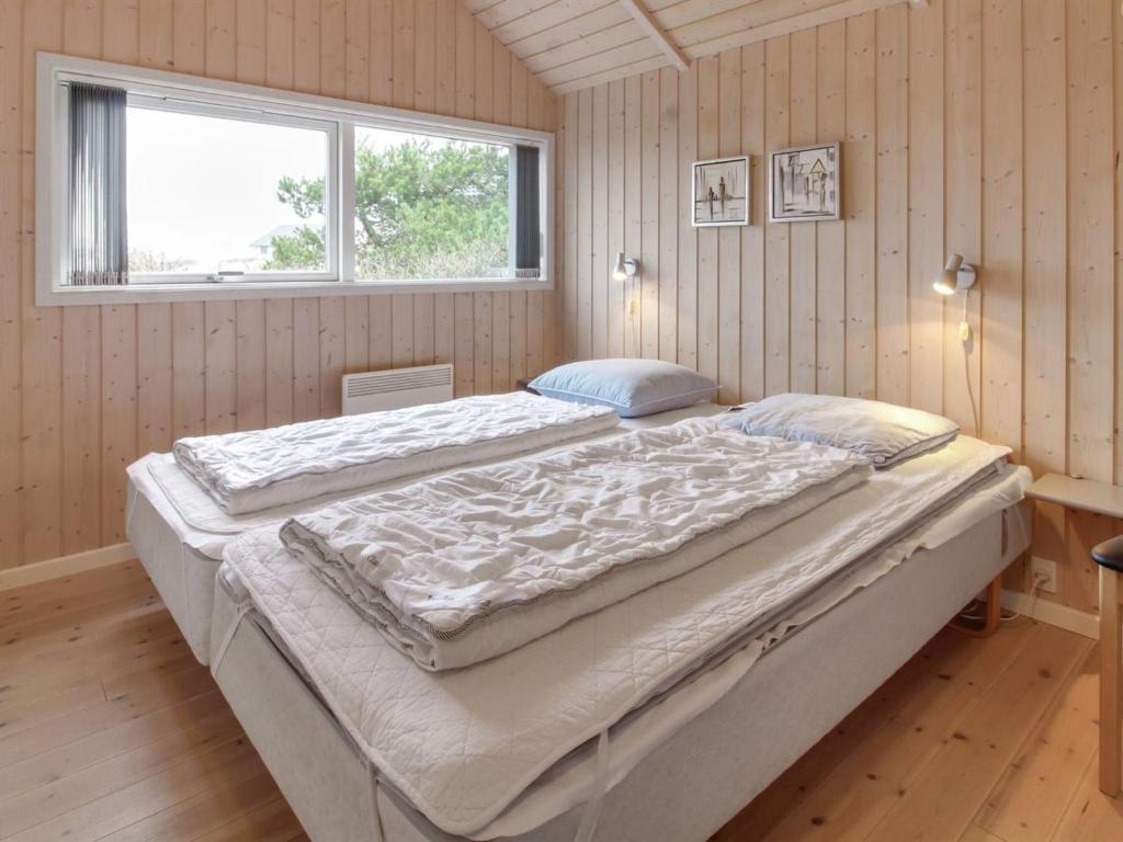 Postel nebo postele na pokoji v ubytování Holiday Home Oivi - 430m from the sea by Interhome