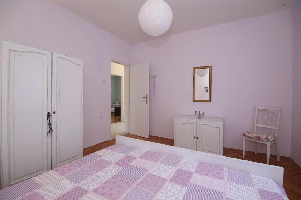 Posteľ alebo postele v izbe v ubytovaní Apartment Providenca