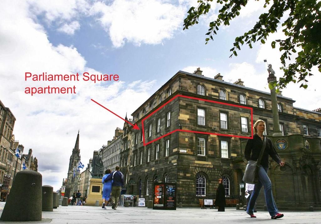 a building with the words permanent square and apartment at Parliament Sq apt 12 Royal Mile in Edinburgh