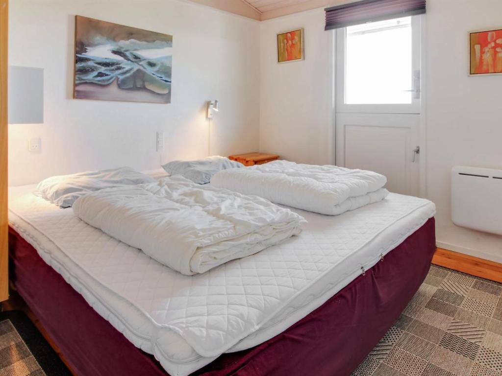 Postel nebo postele na pokoji v ubytování Holiday Home Dalia - 200m from the sea by Interhome