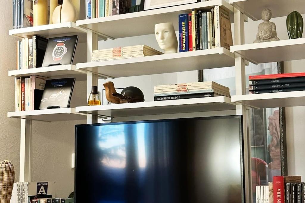 TV a/nebo společenská místnost v ubytování Dimora Roè