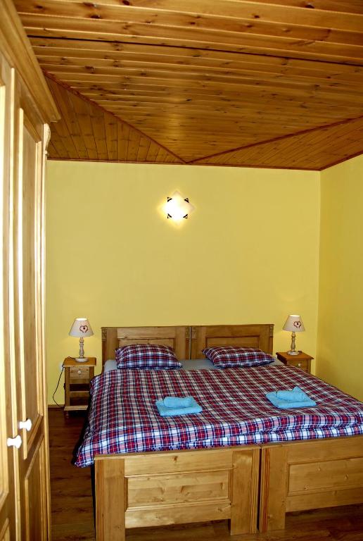 Postel nebo postele na pokoji v ubytování Pension Cortina