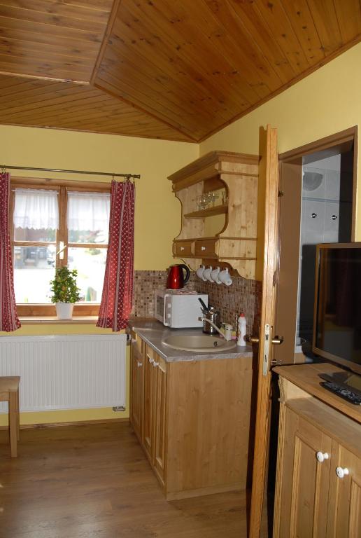 Kuchyň nebo kuchyňský kout v ubytování Pension Cortina