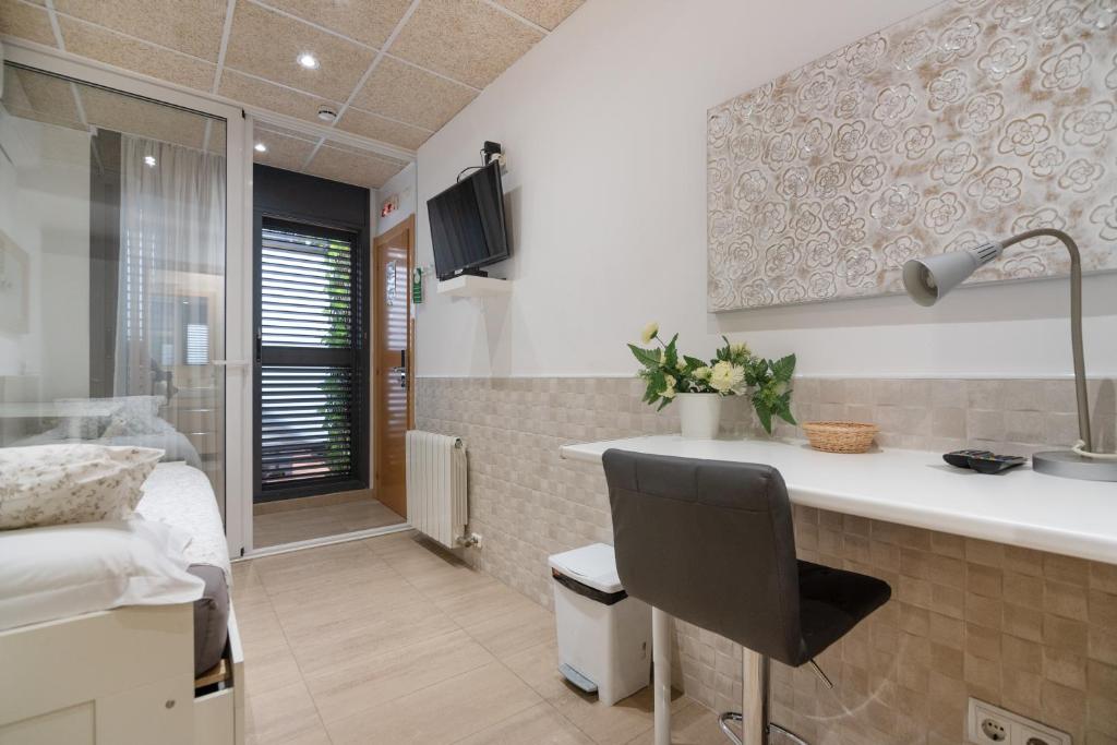 Posteľ alebo postele v izbe v ubytovaní Hostal House