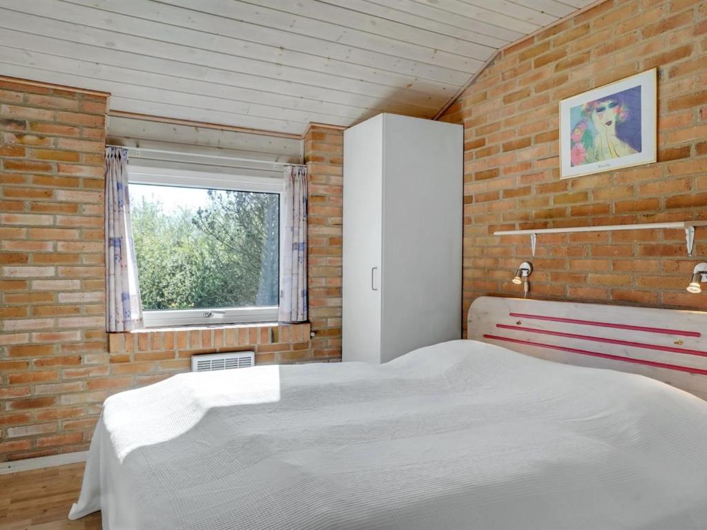 Postel nebo postele na pokoji v ubytování Holiday Home Svane - 1-2km from the sea by Interhome