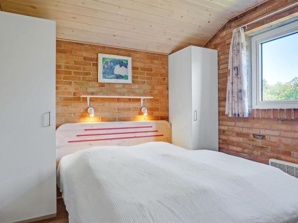 Postel nebo postele na pokoji v ubytování Holiday Home Svane - 1-2km from the sea by Interhome
