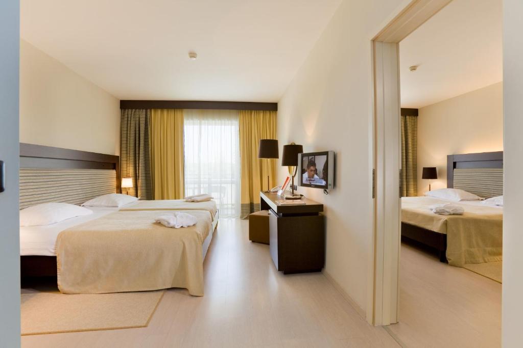 Postel nebo postele na pokoji v ubytování Hotel Garden Istra Plava Laguna